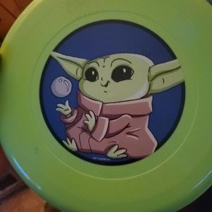 - 2 different  baby yoda  Frisbees